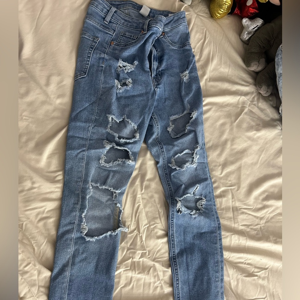 Distressed Blue Jeans